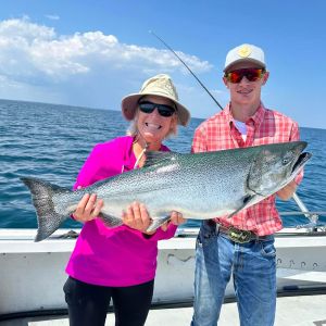 Grandma and grandson with an amazing salmon